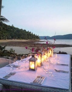 Candle-lit dinner setting Paradise Bay