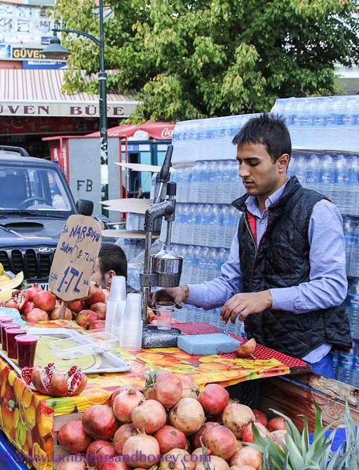 vendor selling pomegranate juice
