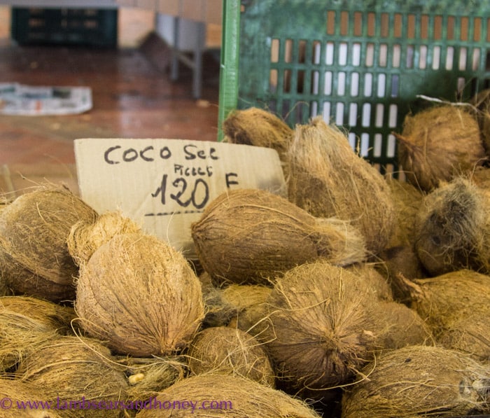 What's a tropical island produce market without fresh coconuts?!