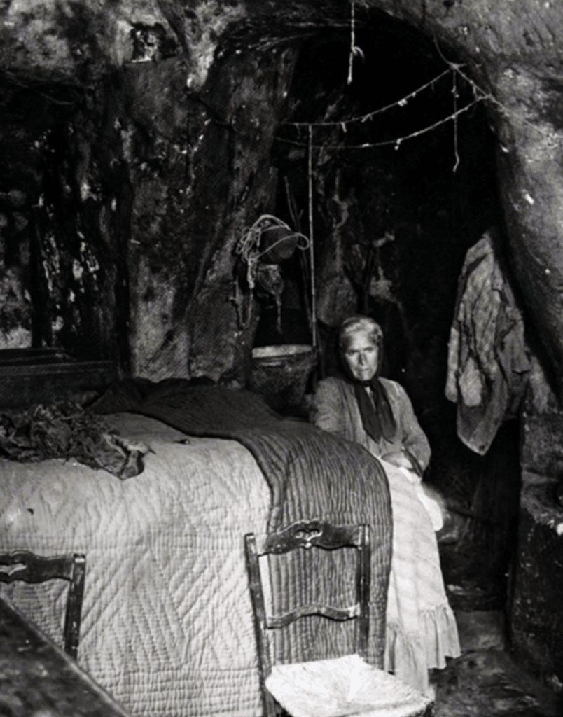 matera, woman in cave house
